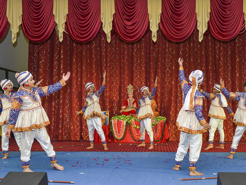 Youths perform a traditional dance