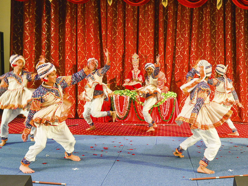 Youths perform a traditional dance