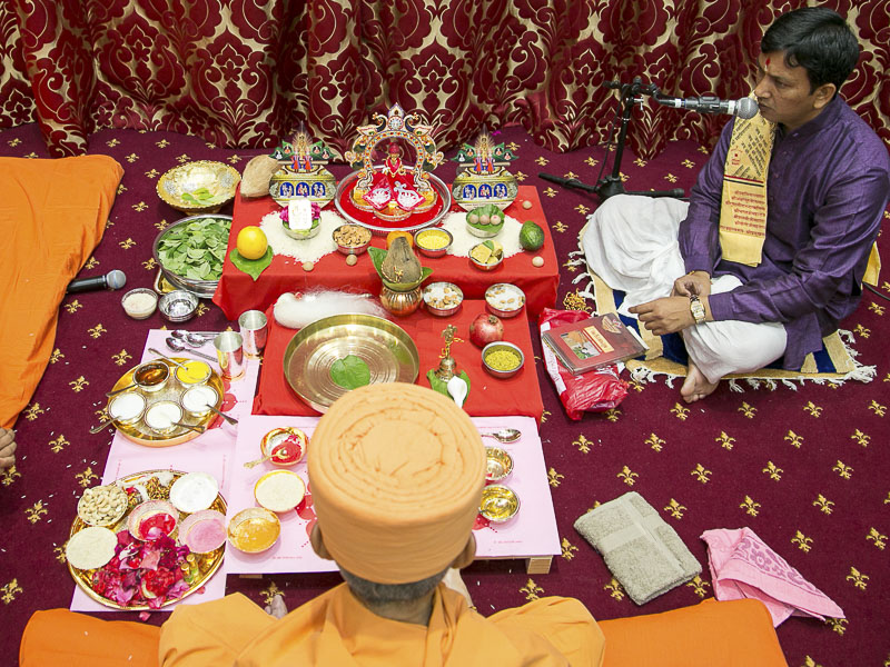 Murti-Pratishtha mahapuja rituals being performed by Pujya Keshavjivan Swami (Pujya Mahant Swami)