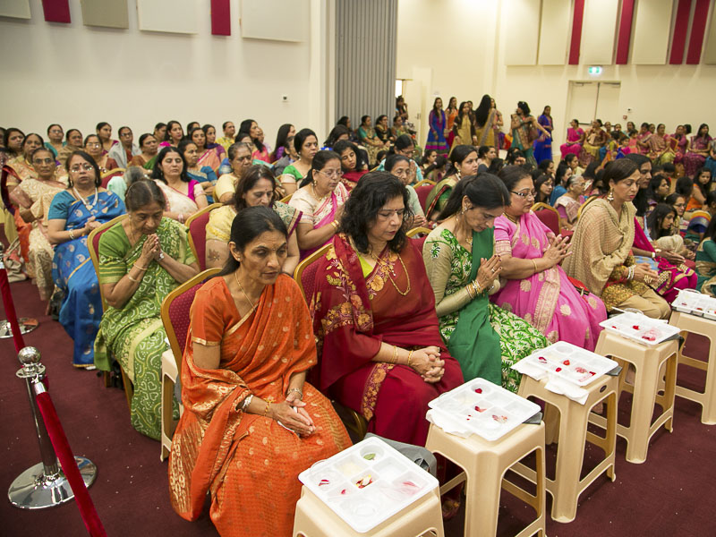Devotees during the murti-pratishtha mahapuja