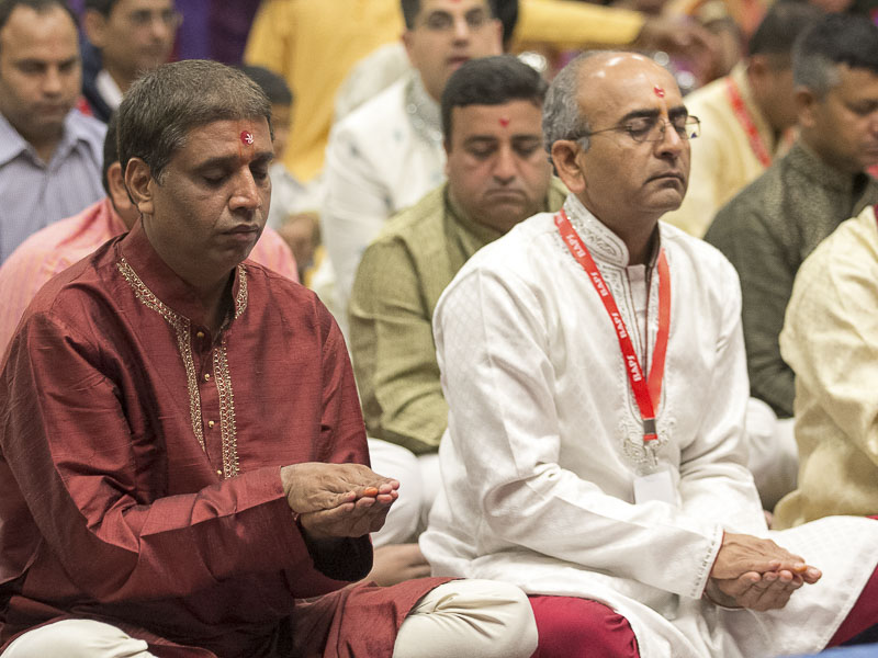 Devotees during the murti-pratishtha mahapuja