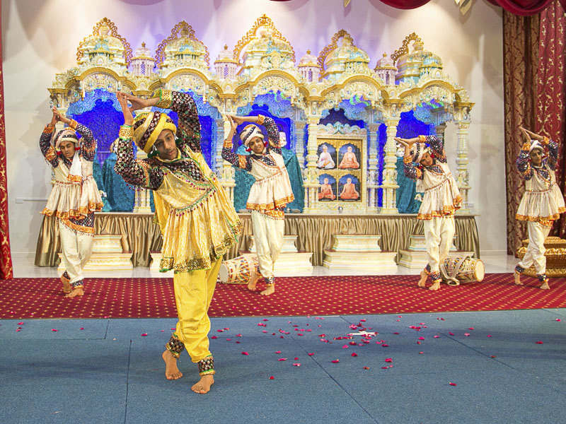 Youths perform a traditional dance